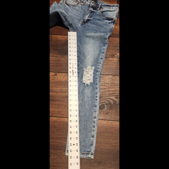 Highrise Distressed Jeans - Picture 14 of 16